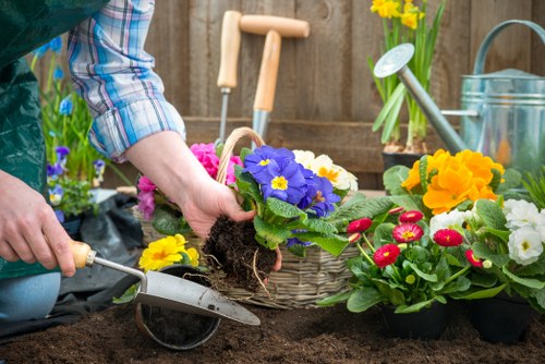 Patio installation process with groundwork and paving stages