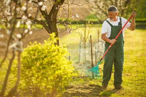Manager overseeing ethical labour practices during a landscaping project